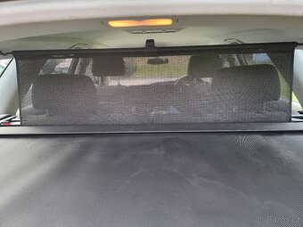 Roleta se síťkou z audi a6 c6 combi 2008 - 2