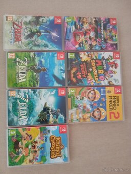 Prodám Nintendo switch 1/2 hry - 2