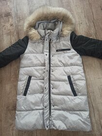 Prošívaná dámská bunda 40 - 2