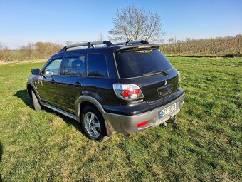 Mitsubishi Outlander 1 - 2