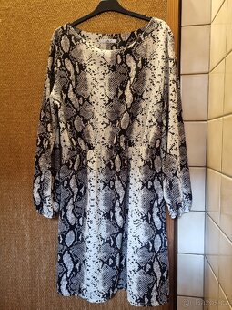 Elegantní společenské šaty. L 40 12. - 2