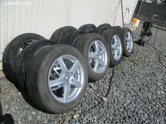 ALU kola KIA SPORTAGE 7X17 ET40 s pneu 225/60 99H - 2