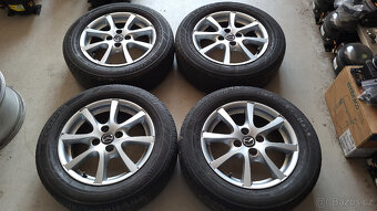Orig. letní ALU kola 15" 4x100 Mazda 2 (2015 a novější) - 2