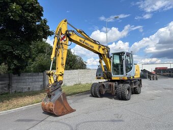 Kolové rypadlo / nakladač New Holland MH CITY - 2