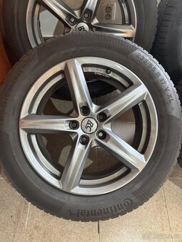 Prodám celoroční pneu 235/55 R17 na ALU kolech 5x112, střed - 2