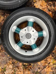 Letni sada MOMO Audi R15 195/65,4x108, ET 37 - 2