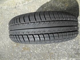 (č.2) Nová 14" plechová kola Ford Fiesta s letními pneu - 2