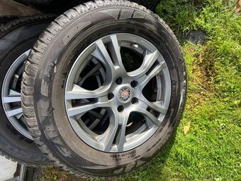 Alu Platin s pneu Falken 215/65/16 - 2