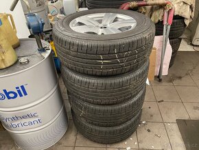 Prodám nové komplety alu disky a pneu z Audi Q7 - 2