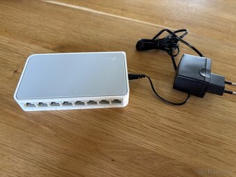 1x wifi router MikroTik, 1x wifi switch TP link - 2