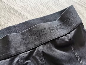 Nove bezecke leginy Nike panske - 2