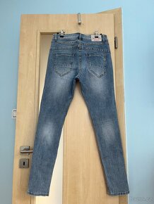Krásné dám. sv. modré jeansy, vel. S/36, sleva 680 Kč - 2