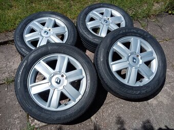 Obutá Alu kola 16ky 4x100 pneu 90% RENAULT DACIA - dobírka - 2