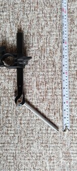 Roland rameno, držák tomu. - 2