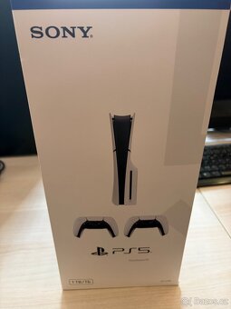 PlayStation 5 (Slim) - 1TB + 2x DualSense Wireless Controlle - 2