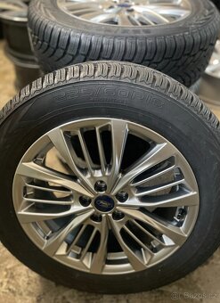 Alu kola + Pneu Ford KUGA III ST CX482 18". zimní - 2