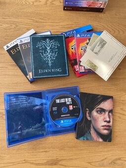 Steelbook artbook - obsahují hry - 2