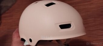 Cyklistická přilba Oxelo (lososová) 48-52cm - 2