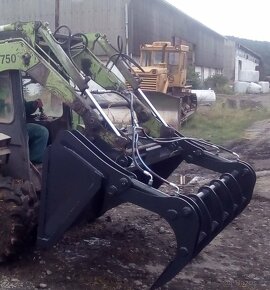 Lopata s přidržovačem pro smykový nakladač - 2