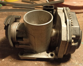 Škrtící klapka Felicia 1,6 - 2