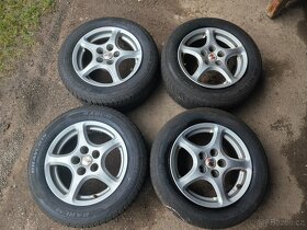 Prodám sadu Alu OZ 7Jx15H2 ET35 + letní pneu 205/60/R15 - 2