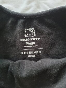 Dívčí bolerka, zn. Reserved, v. 146/152 - 2