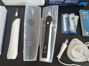 Prodám sadu (2 ks) elektrický zubní kartáček Oral - 2