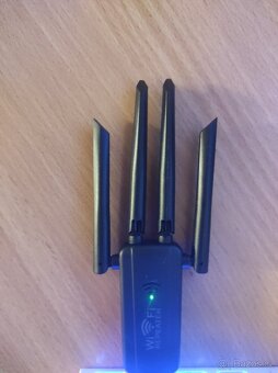 nový WiFi rozšiřovač signálu 150Mbps a 300Mbps - 2