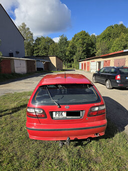 Nissan Almera 1.4 16V Spring hatchback garazovany - 2