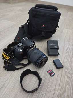 Nikon D5100 + AF-S NIKKOR 18-105mm + HOYA UV. 100% stav - 2