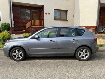 Mazda 3 1,4 - 2