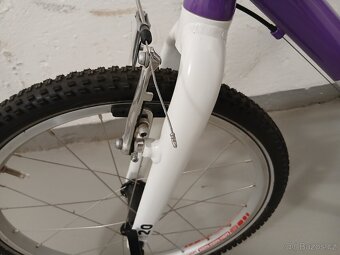 Woom 4 jak nové - 2