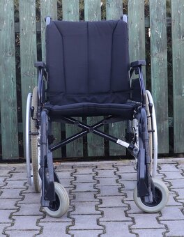 028-Mechanický invalidní vozík Tomtar. - 2