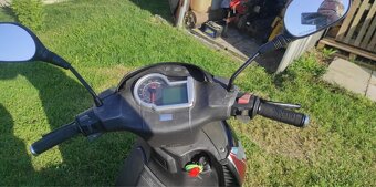 Aprilia sport city s kufrem - 2