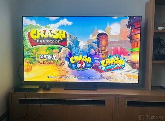 PlayStation 4 Slim 500 GB + originální ovladač + 2 hry - 2