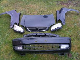 Opel Zafira kapota, nárazník, světla, blatníky - 2