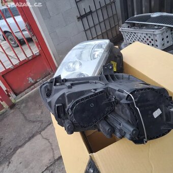 Predni světla vw Caddy / touran Na jednom je jeden držák ok - 2
