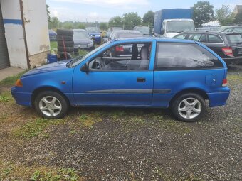 Suzuki Swift 1.0i, 39kW, 10/2001, klima - 2