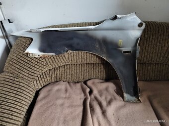 Blatník Mitsubishi Lancer 2010 - 2