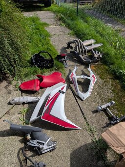 Tlumiče R1 2007-08 + dily - 2