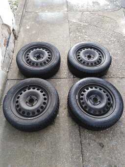 4x ocelové disky Opel GM rozteč 6Jx15 H2 ET 49, zimní pneu 1 - 2