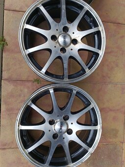 Alu kola Dezent 4x100 r 15 - 2