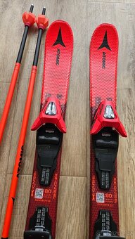 Atomic dětské lyže - Redster J2 s hůlkami - 2