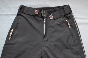Černé chlapecké zimní zateplené kalhoty vel. 152 There here - 2