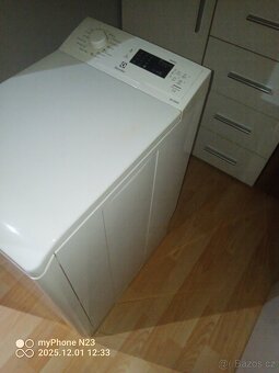 Vrchem plněná pračka Electrolux - 2
