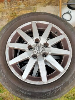 Nissan Primera P12 ALU kola R16 - 2