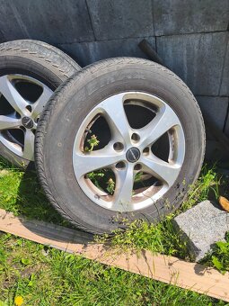 ALU kola s pneu 4x / 16 - 2