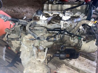 Subaru justy swift - 2