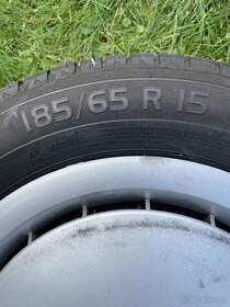 Plechové disky s originál poklicemi Mercedes 190E - 2
