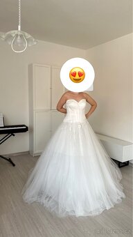 Č.008 Svatební šaty nové vel L-XL - 2